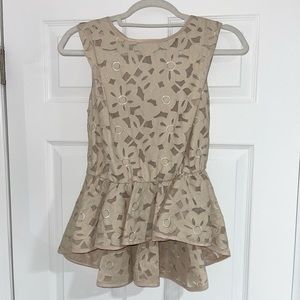 Gorgeous, one-of-a-kind piece from Gracia! Sleeveless blouse.